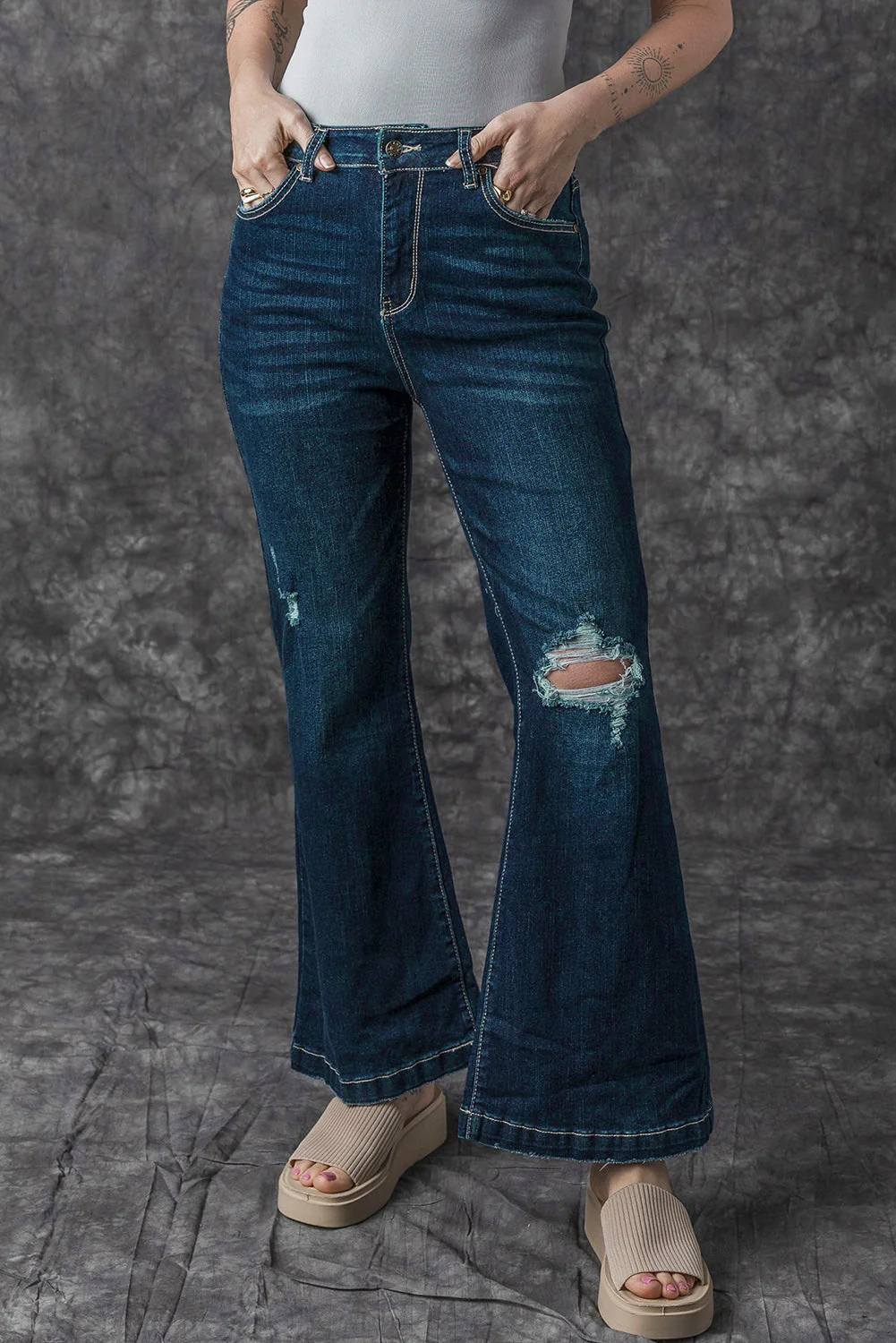 High Rise Ripped Bell Bottom Jeans