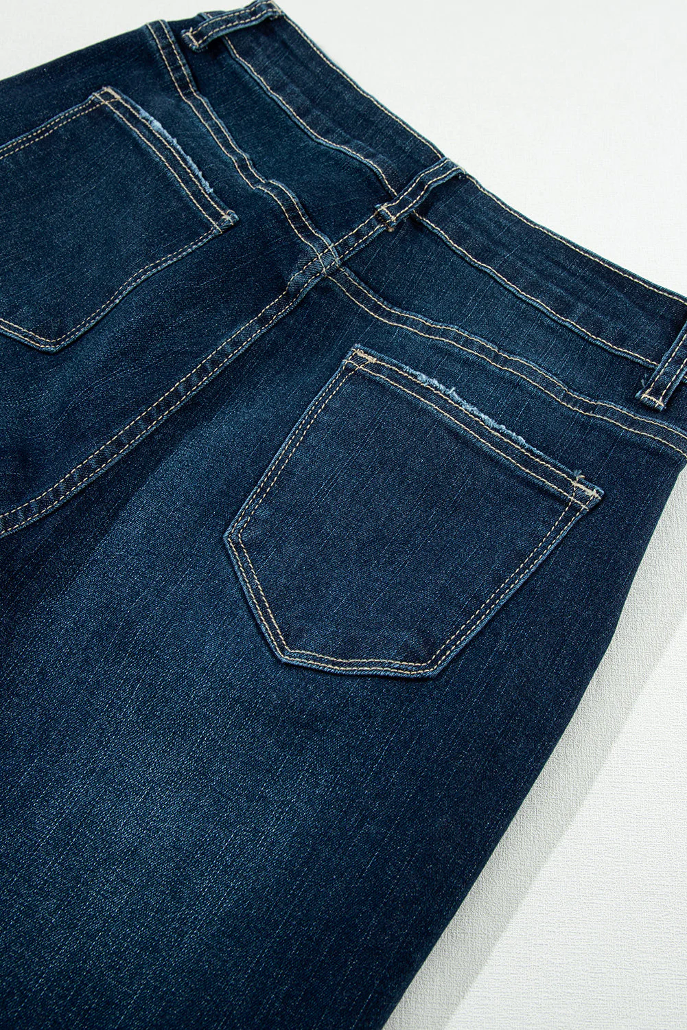 High Rise Ripped Bell Bottom Jeans