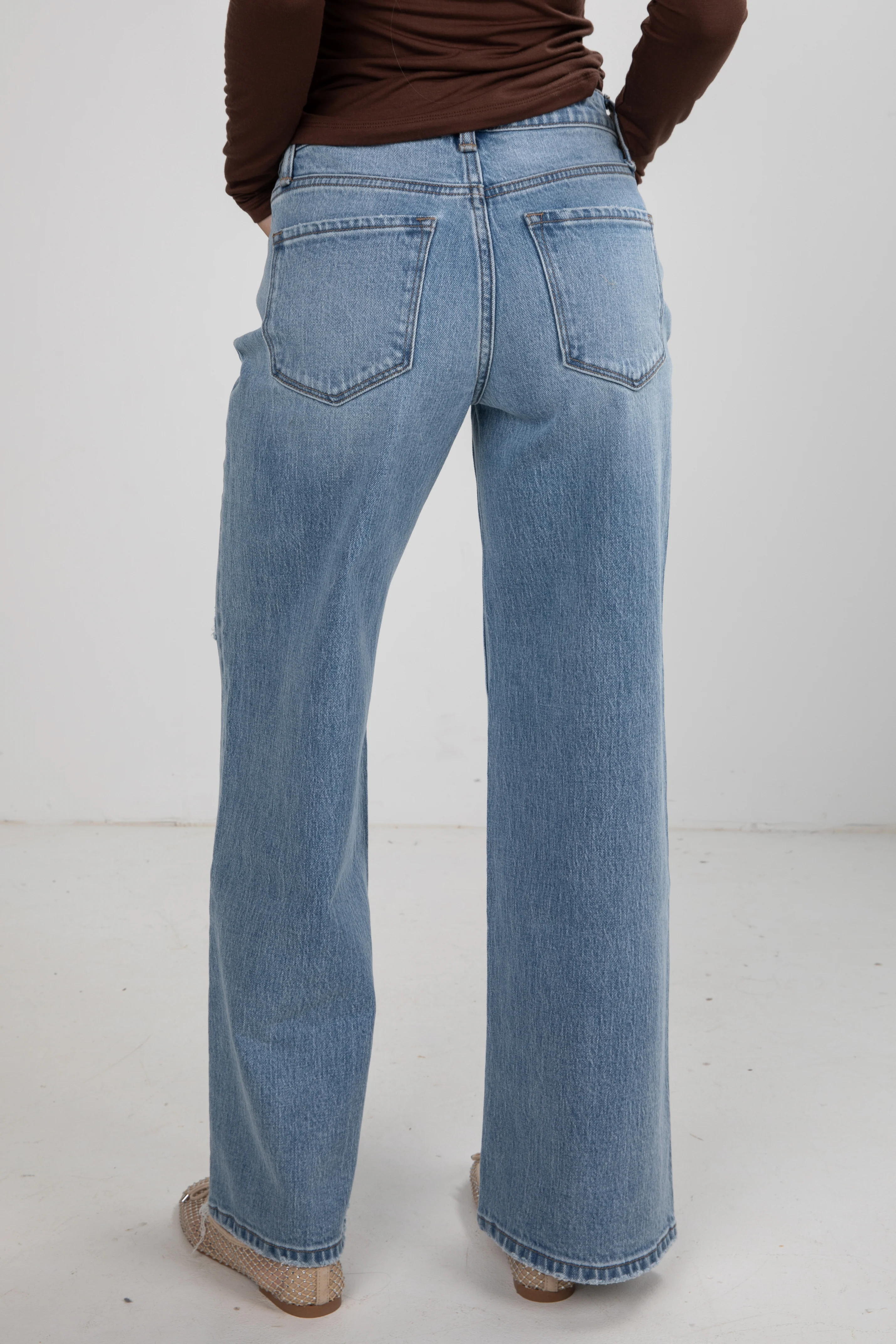 Light Wash High-Rise Distressed Wide Leg Jeans